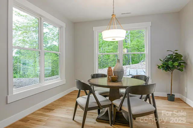 a bed room with a bed mirror and window