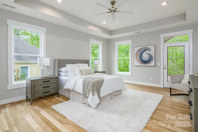 a bed room with a bed and a dresser