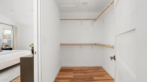 a view of a room with racks on the wall