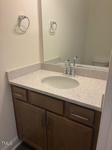 3608 Delta Drive, Unit EP 136 Wilson, NC 27896 - Photo 2 of 25 a bathroom with a granite countertop sink and a mirror
