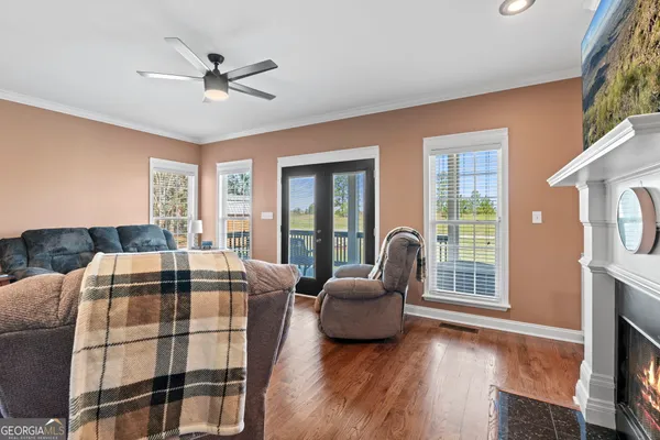 a bed room with furniture and a window