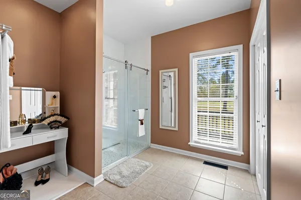 a view of an empty room with front door