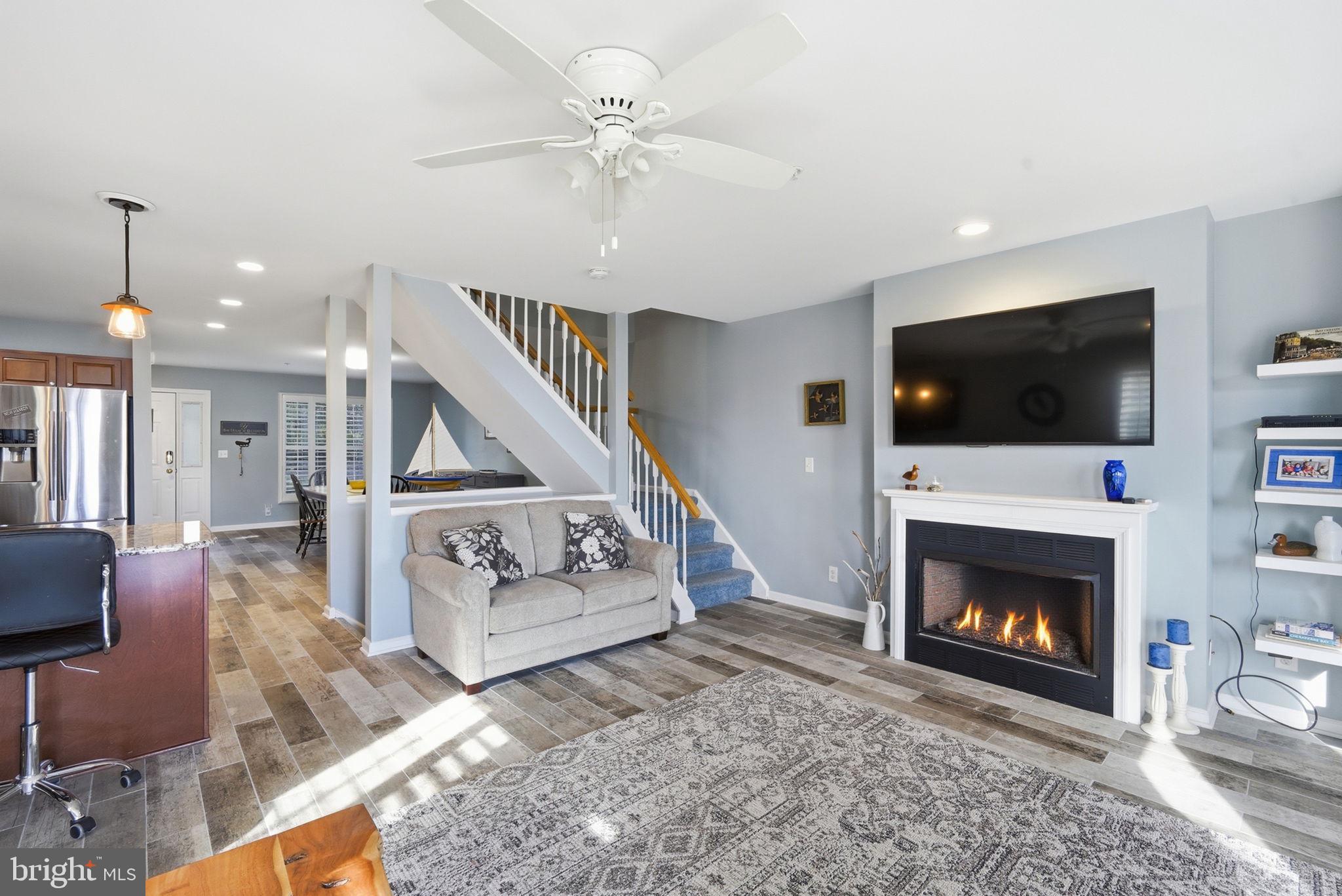 1 Idlewhile Avenue, Unit 4 Betterton, MD 21610 - Photo 30 of 43 Living room with propane FP