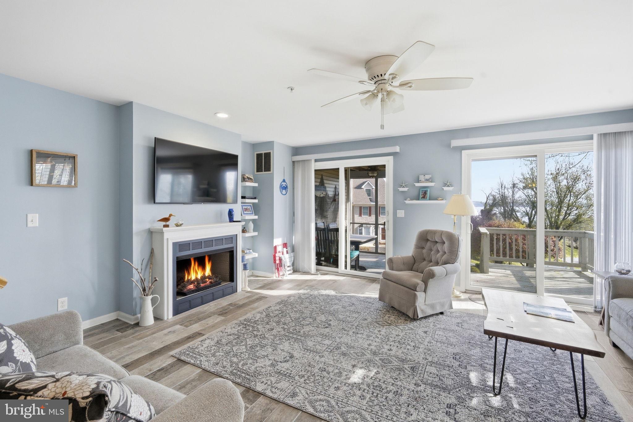 1 Idlewhile Avenue, Unit 4 Betterton, MD 21610 - Photo 32 of 43 Living room with propane FP