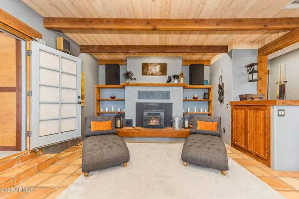 a bed room with a bed and a large window