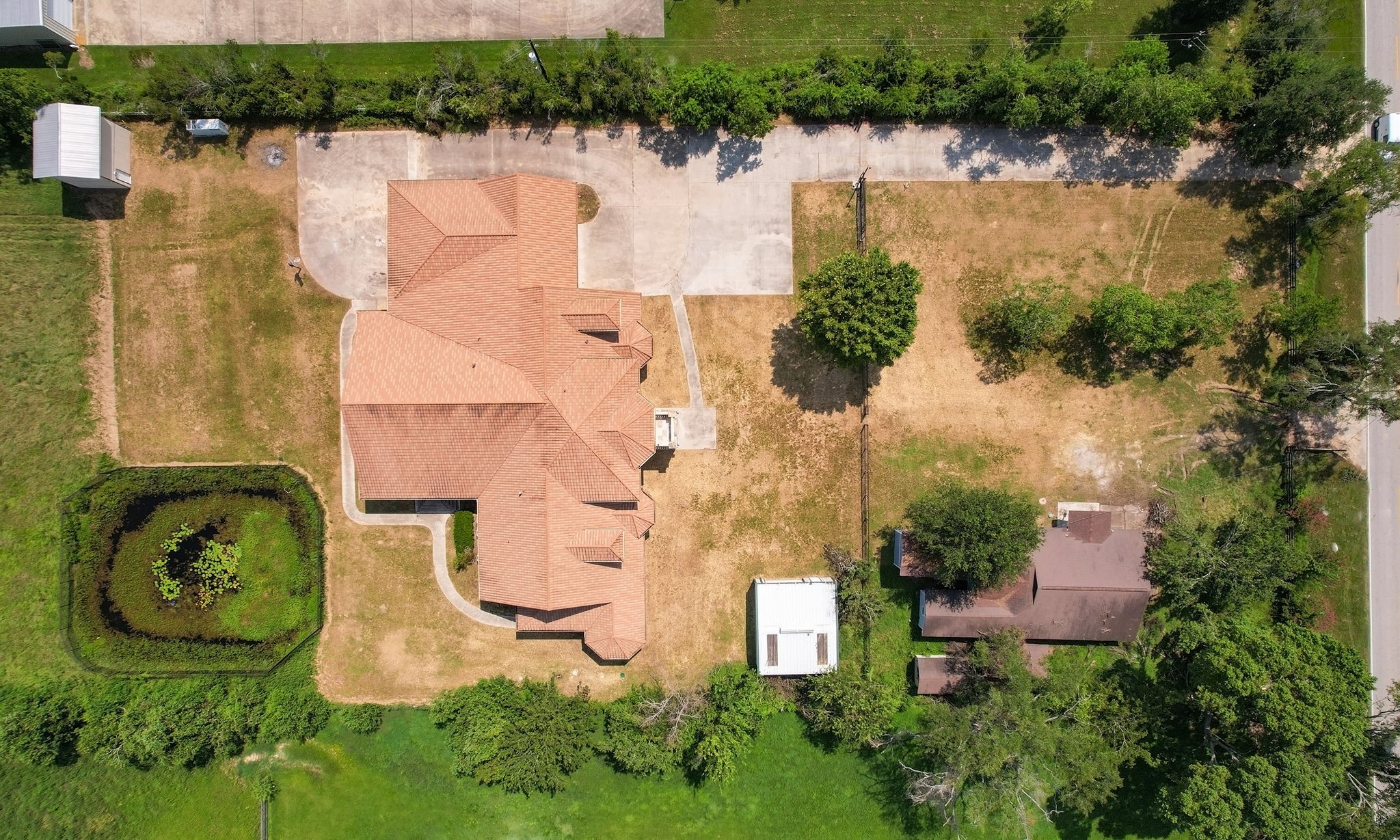 17018 Grant Road Cypress, TX 77429 - Photo 50 of 50 an aerial view of a house with outdoor space and lake view