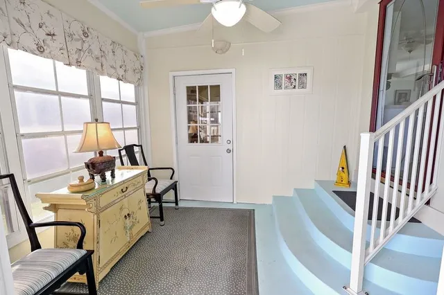 a room with furniture and window