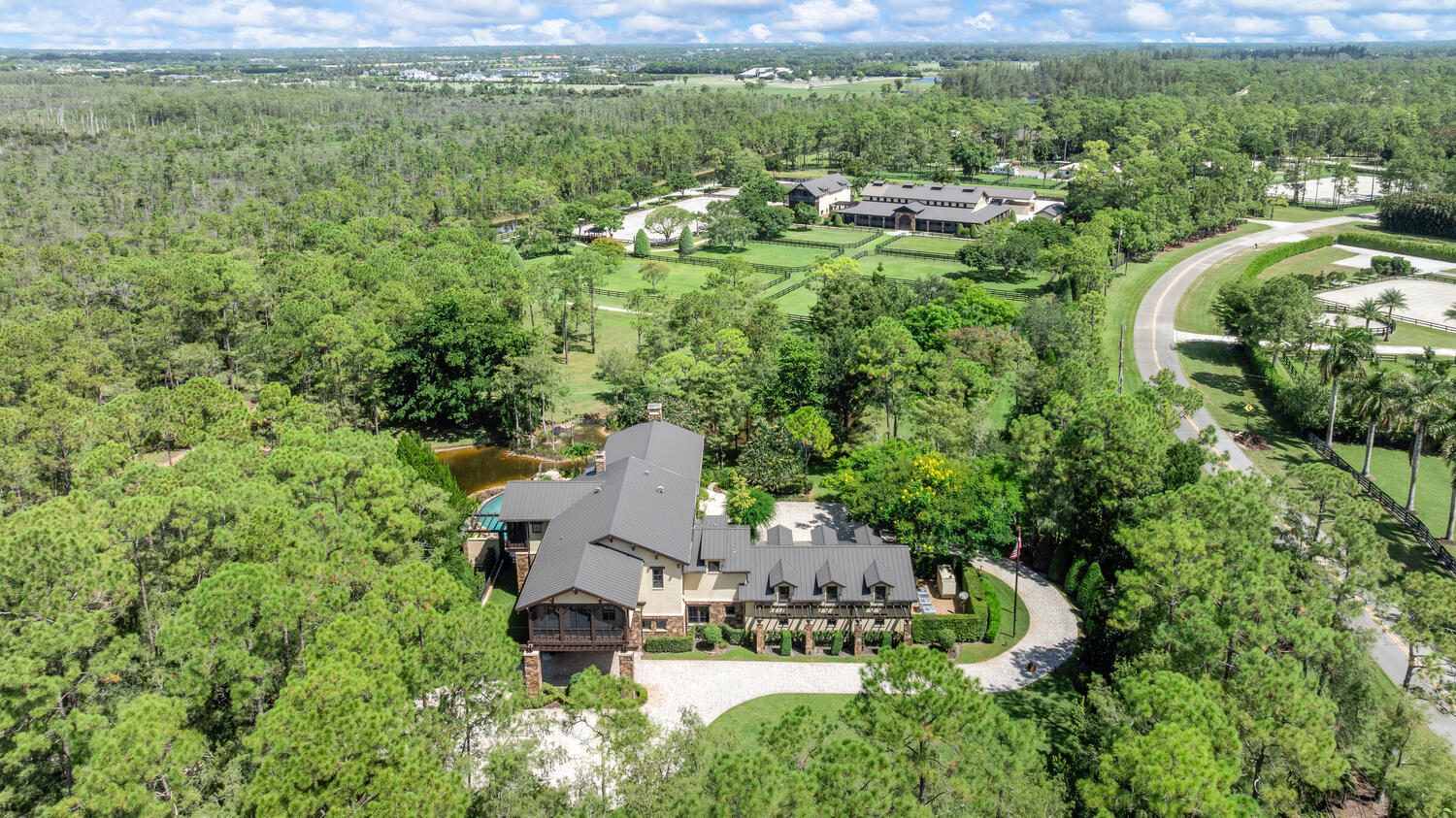 6259 Homeland Road Lake Worth, FL 33449 - Photo 3 of 62 a view of a house with a garden