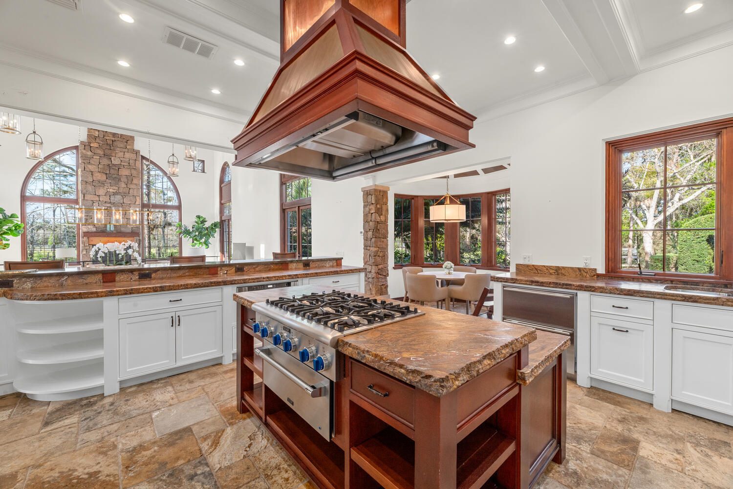 6259 Homeland Road Lake Worth, FL 33449 - Photo 35 of 62 a kitchen with stainless steel appliances granite countertop a stove a sink and a refrigerator