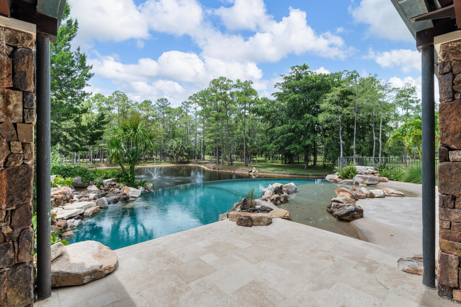6259 Homeland Road Lake Worth, FL 33449 - Photo 42 of 62 a view of a lake with couches and city view