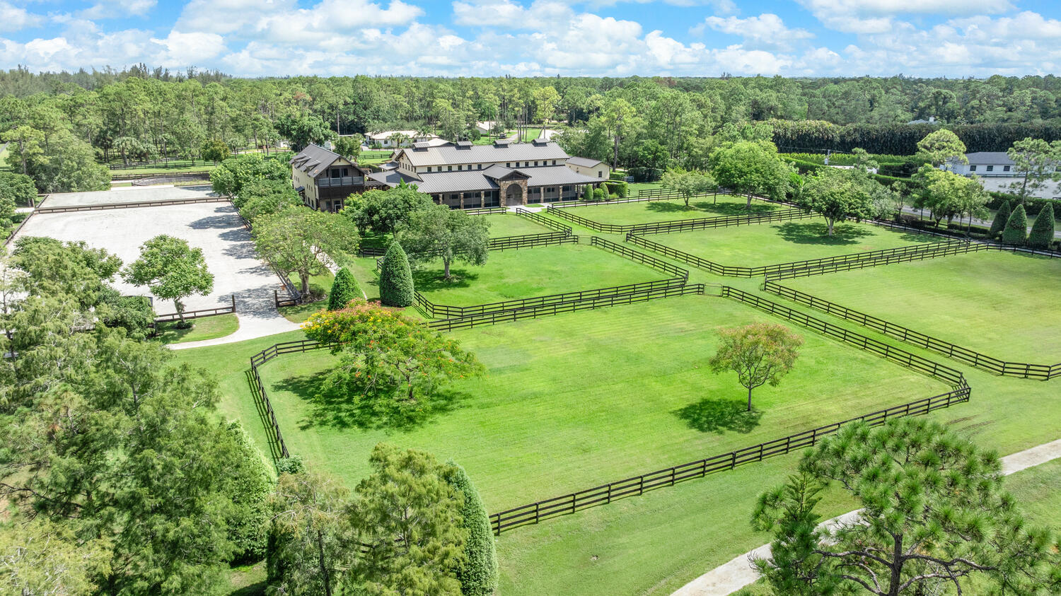 6259 Homeland Road Lake Worth, FL 33449 - Photo 50 of 62 an aerial view of residential houses with outdoor space and street view