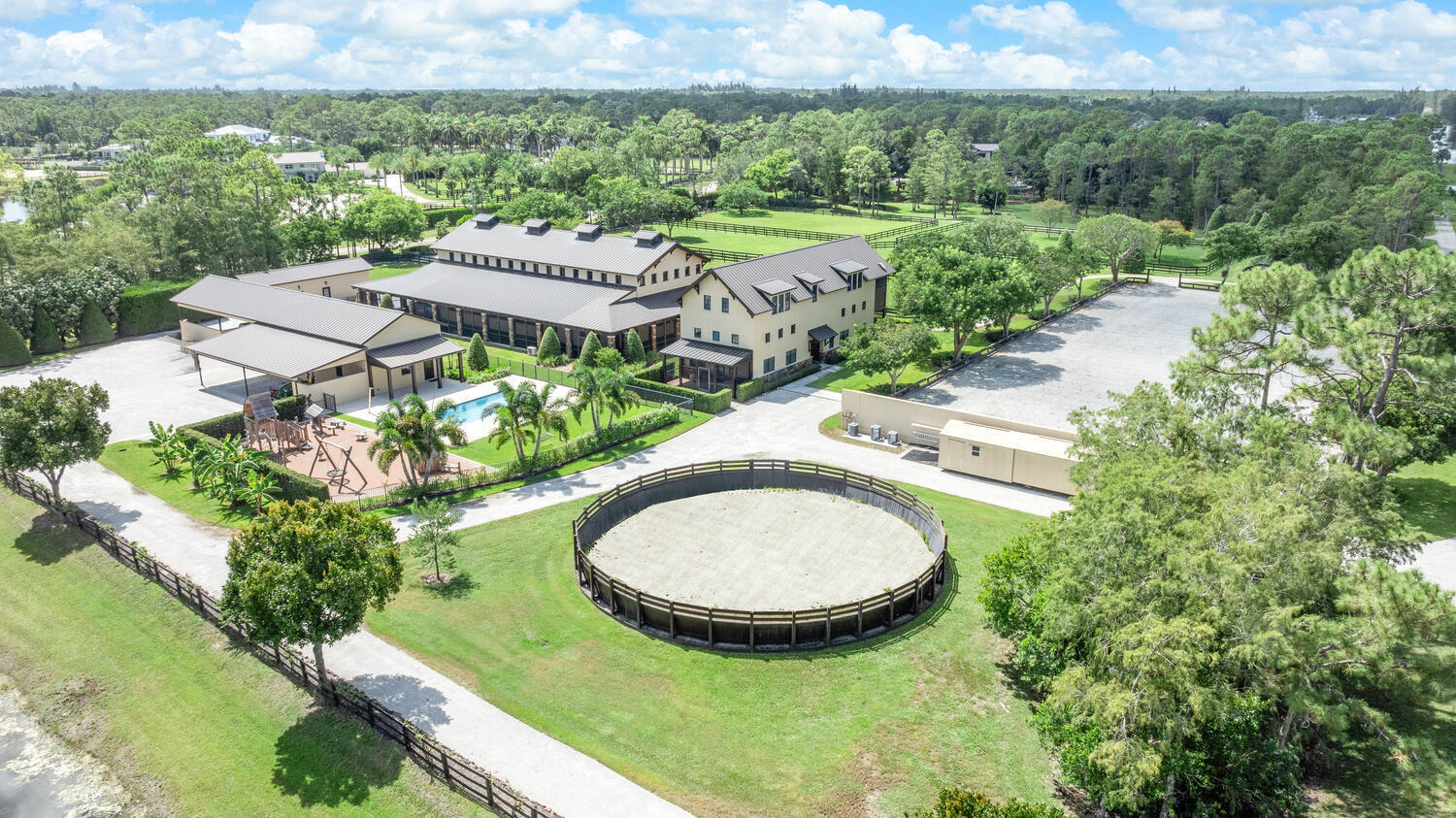 6259 Homeland Road Lake Worth, FL 33449 - Photo 5 of 62 an aerial view of a house