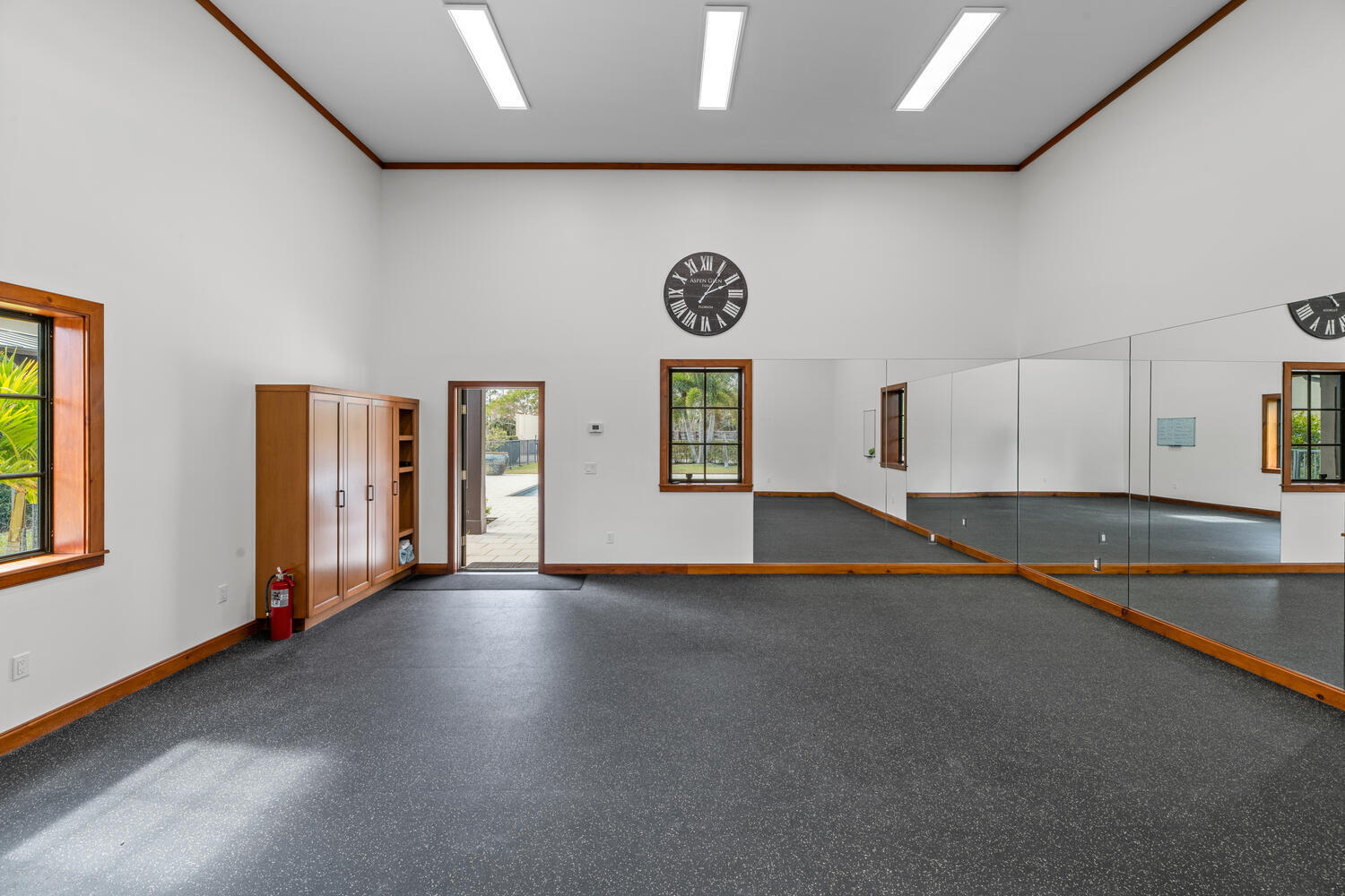 6259 Homeland Road Lake Worth, FL 33449 - Photo 54 of 62 a view of an empty room with a window and kitchen