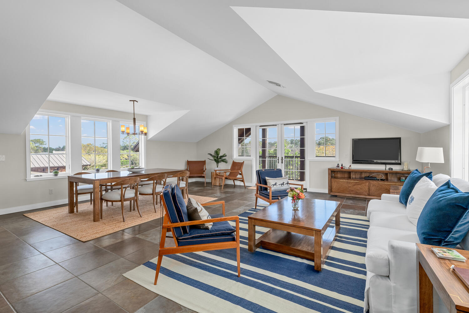 6259 Homeland Road Lake Worth, FL 33449 - Photo 55 of 62 a living room with furniture and a flat screen tv