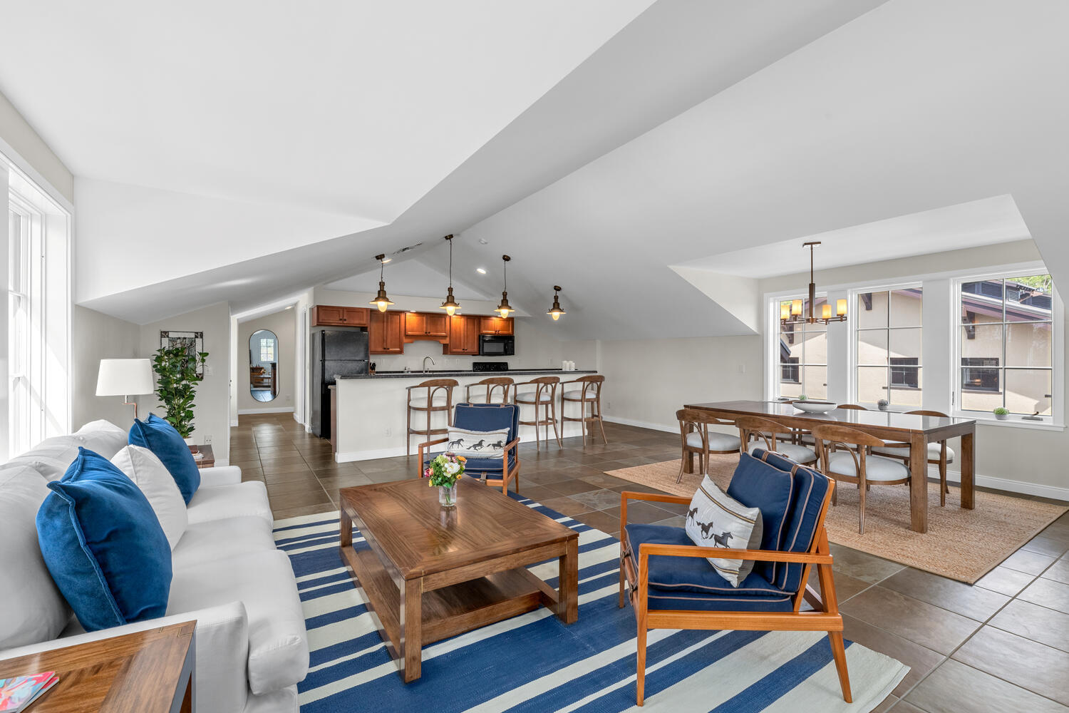 6259 Homeland Road Lake Worth, FL 33449 - Photo 56 of 62 a living room with furniture a rug and a table