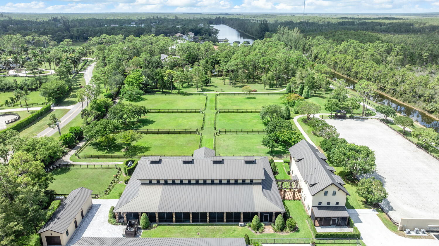 6259 Homeland Road Lake Worth, FL 33449 - Photo 7 of 62 an aerial view of a house with a yard