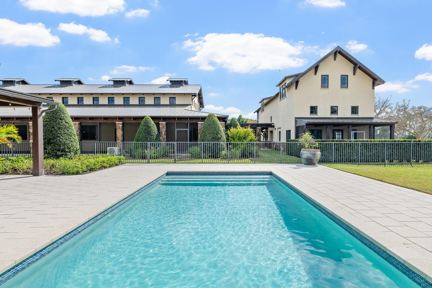 6259 Homeland Road Lake Worth, FL 33449 - Photo 8 of 62 a view of house with swimming pool and a yard