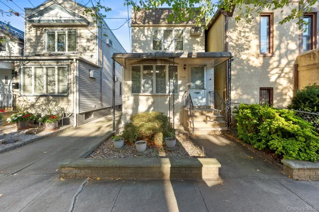 a view of a brick building with many windows