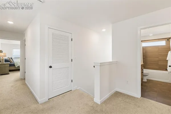 a view of a livingroom and a bathroom