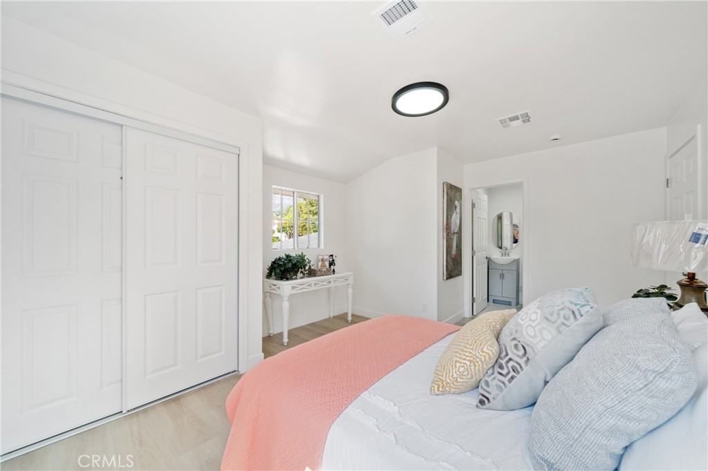 347 Stedman Place Monrovia, CA 91016 - Photo 17 of 25 a bedroom with a bed and a dresser