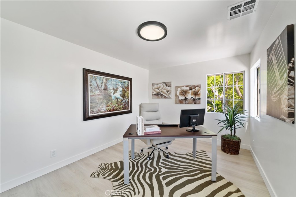 347 Stedman Place Monrovia, CA 91016 - Photo 19 of 25 a view of a livingroom with furniture window and wooden floor