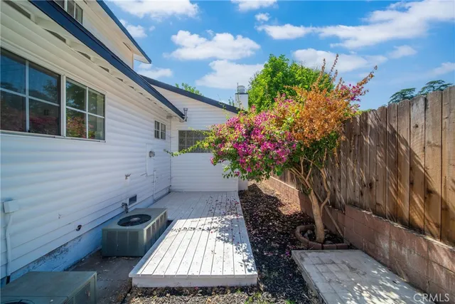 a view of a backyard with plants