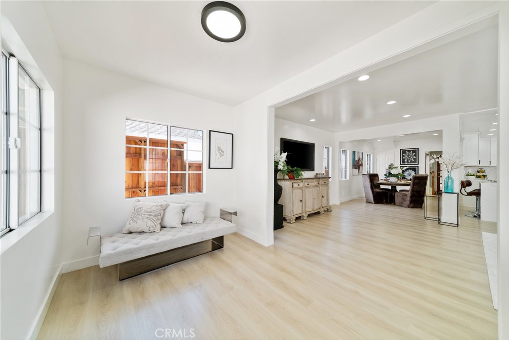 347 Stedman Place Monrovia, CA 91016 - Photo 4 of 25 a living room with furniture and kitchen view