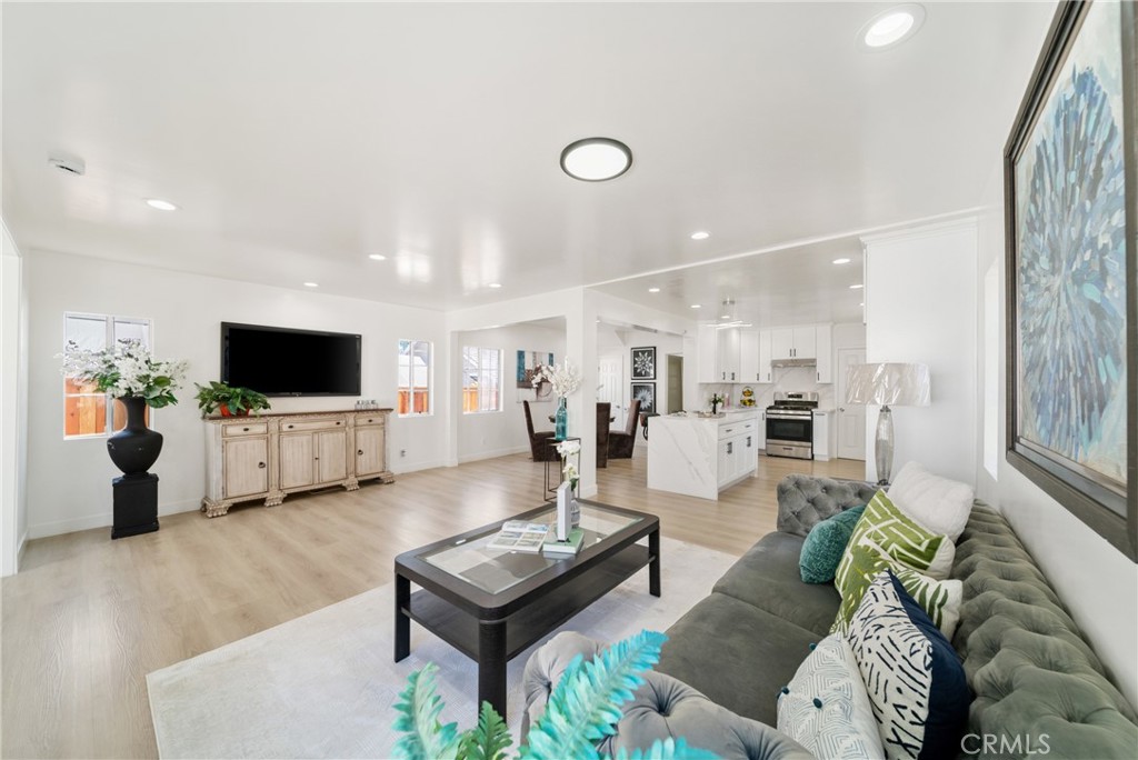 347 Stedman Place Monrovia, CA 91016 - Photo 7 of 25 a living room with furniture and a flat screen tv