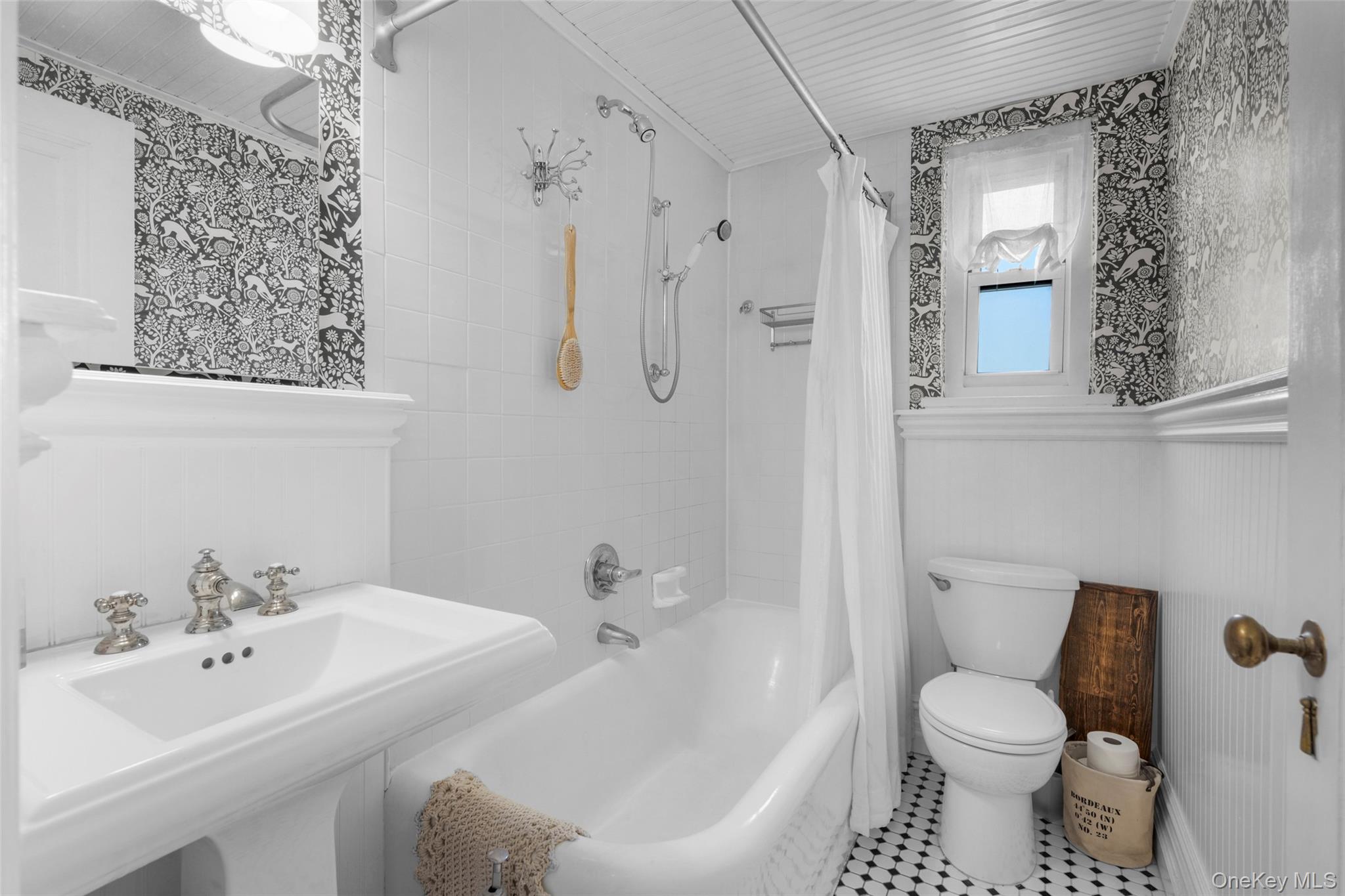 910 Stuart Avenue, Unit 4L Mamaroneck, NY 10543 - Photo 19 of 32 a bathroom with a sink toilet and shower