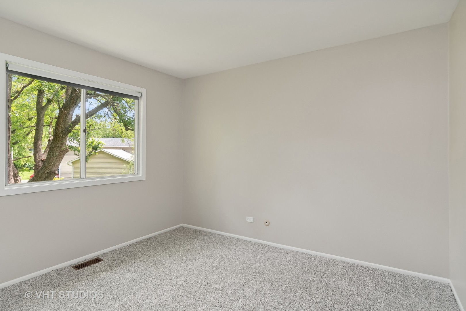 412 Quarry Drive Bolingbrook, IL 60490 - Photo 17 of 23 an empty room with a window