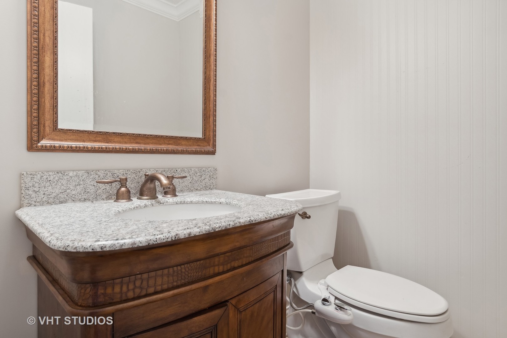 412 Quarry Drive Bolingbrook, IL 60490 - Photo 19 of 23 a bathroom with a granite countertop toilet sink and mirror