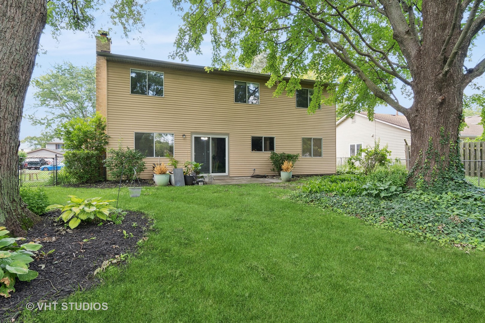 412 Quarry Drive Bolingbrook, IL 60490 - Photo 21 of 23 a front view of house with yard and green space