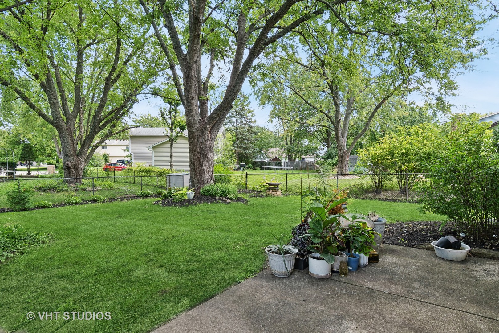 412 Quarry Drive Bolingbrook, IL 60490 - Photo 22 of 23 a view of a garden with patio
