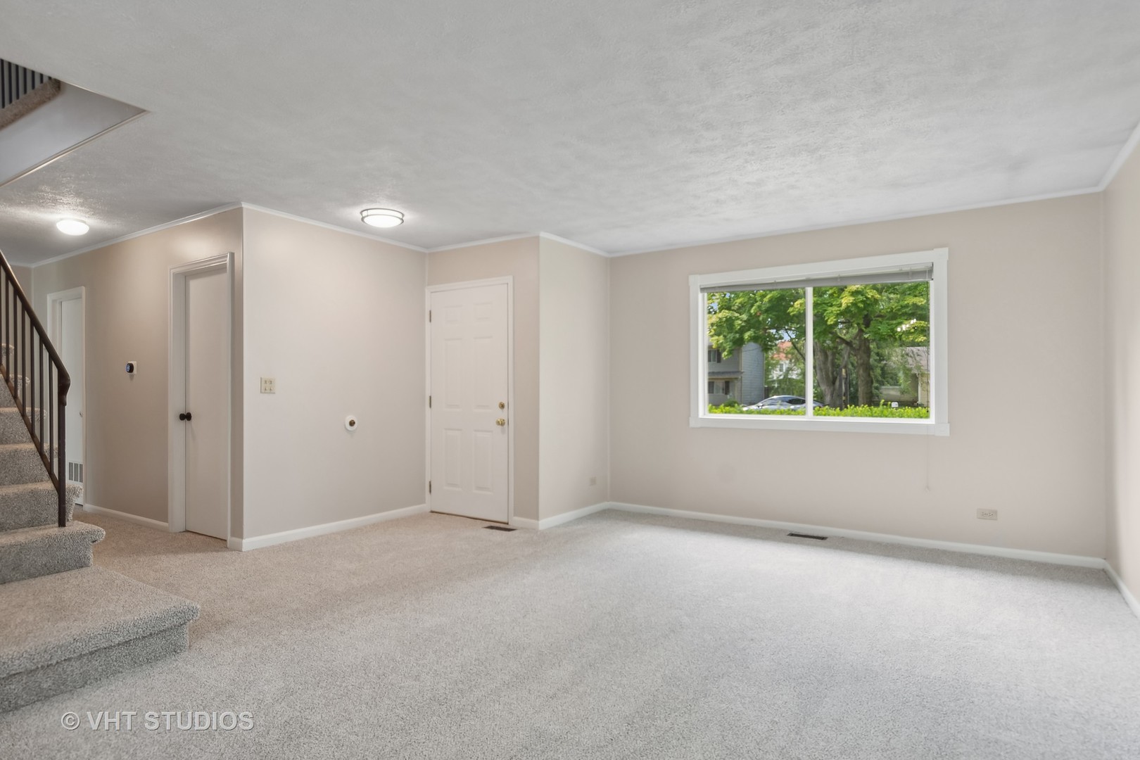 412 Quarry Drive Bolingbrook, IL 60490 - Photo 3 of 23 an empty room with a window