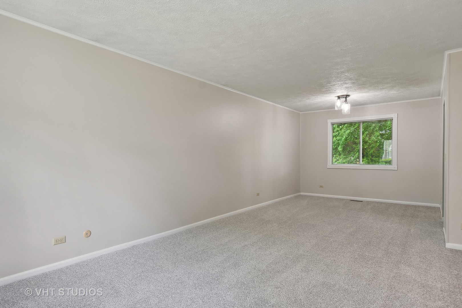 412 Quarry Drive Bolingbrook, IL 60490 - Photo 5 of 23 an empty room with a window