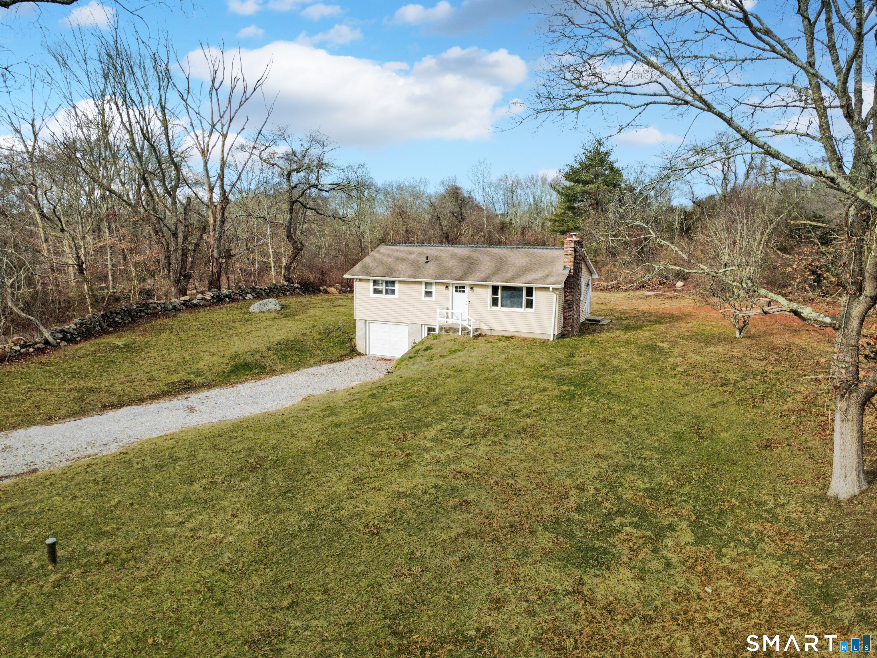 179 North Anguilla Road Stonington, CT 06379 - Photo 2 of 21 a view of a big yard with large trees