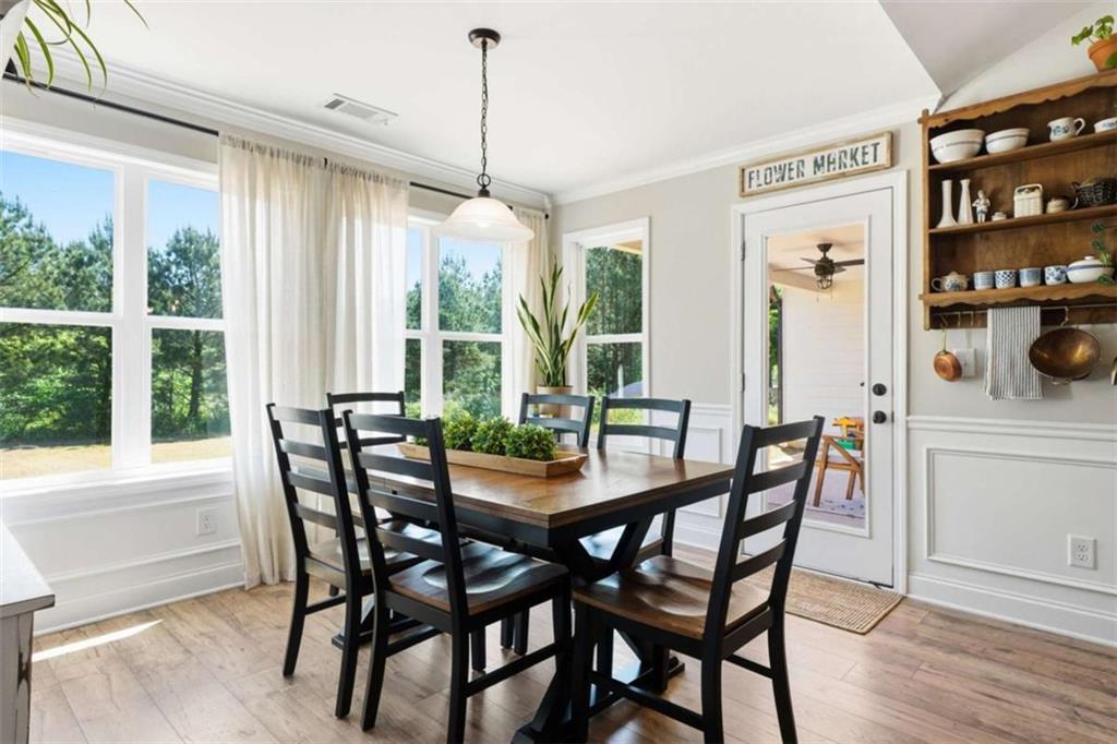 189 Marie Court Bethlehem, GA 30620 - Photo 28 of 57 a view of a dining room with furniture window and outside view