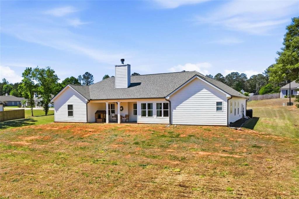 189 Marie Court Bethlehem, GA 30620 - Photo 55 of 57 a house view with a garden space