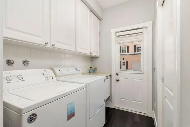 a utility room with dryer and washer