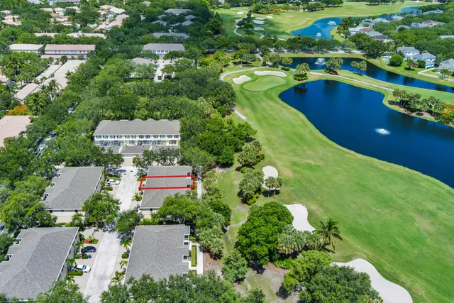 an aerial view of a house with a garden