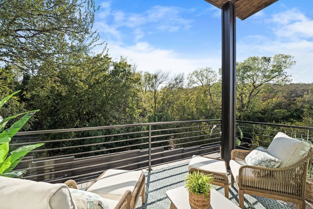 5001 Childers Path Austin, TX 78741 - Photo 13 of 40 Balcony featuring outdoor lounge area