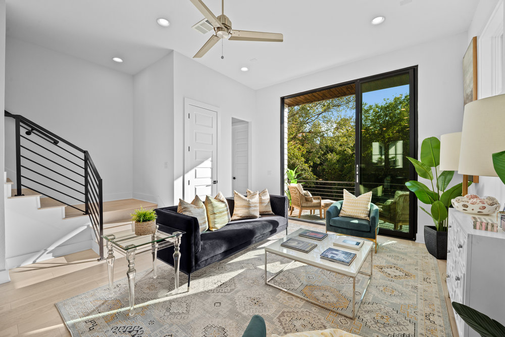 5001 Childers Path Austin, TX 78741 - Photo 18 of 40 Living area featuring light wood-style floors, recessed lighting, stairway, and ceiling fan