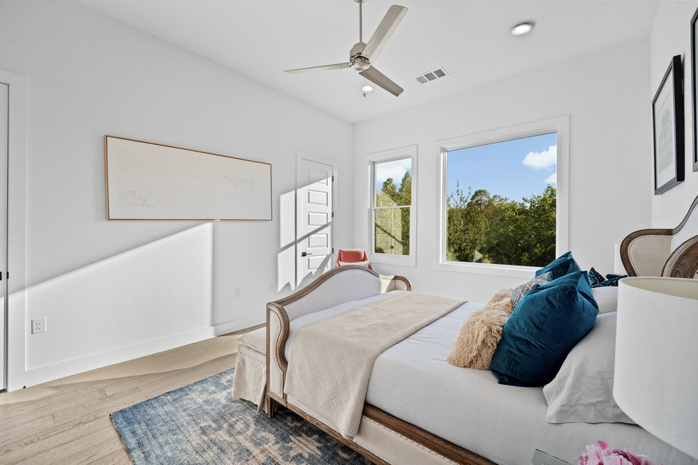5001 Childers Path Austin, TX 78741 - Photo 20 of 40 Bedroom featuring wood finished floors, ceiling fan, and recessed lighting