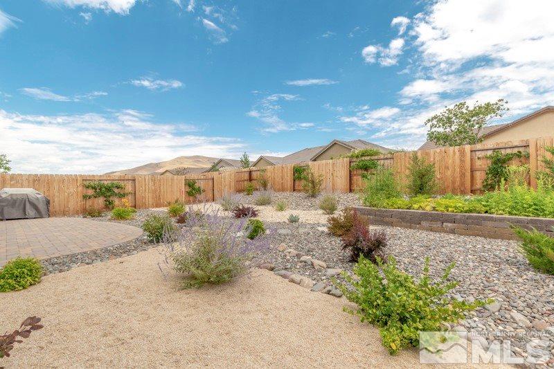 9840 Nahar Lane Reno, NV 89521 - Photo 18 of 25 a view of a street with a houses