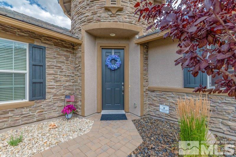 9840 Nahar Lane Reno, NV 89521 - Photo 2 of 25 a front view of a house
