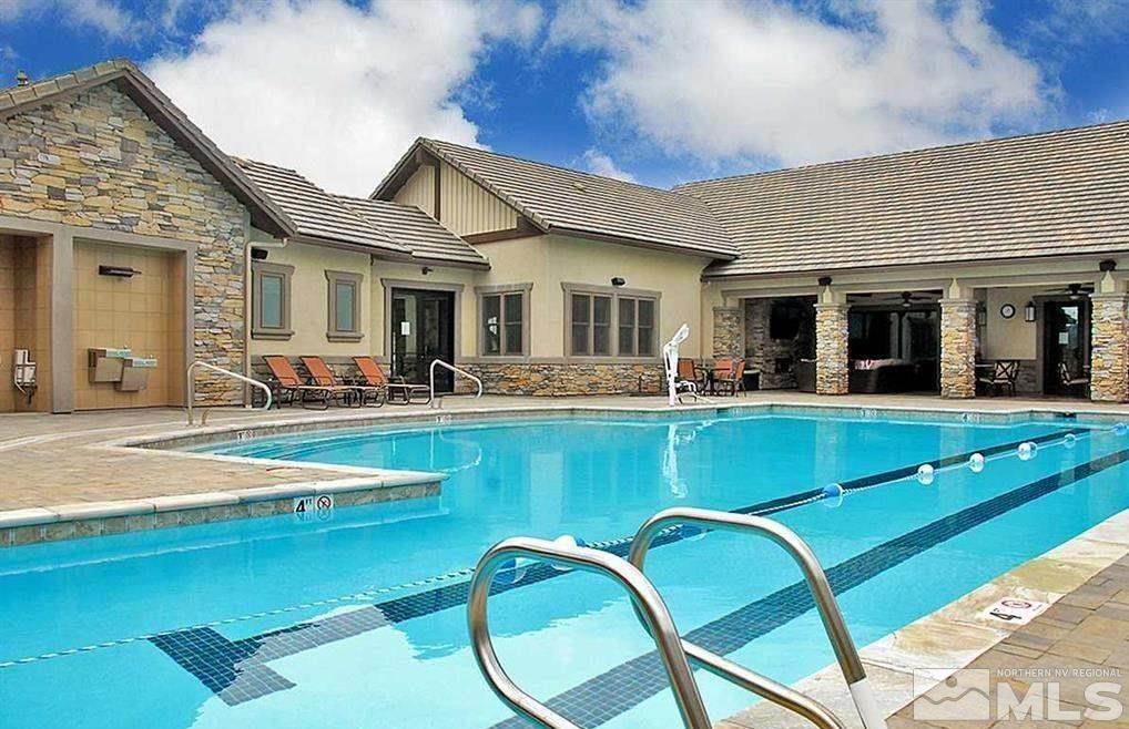 9840 Nahar Lane Reno, NV 89521 - Photo 23 of 25 a view of a patio with swimming pool table and chairs