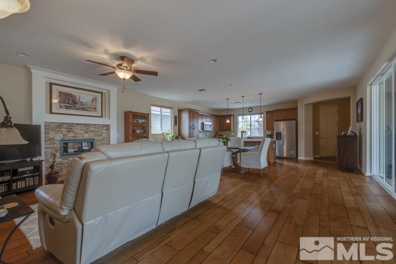 9840 Nahar Lane Reno, NV 89521 - Photo 8 of 25 a living room with furniture and a wooden floor