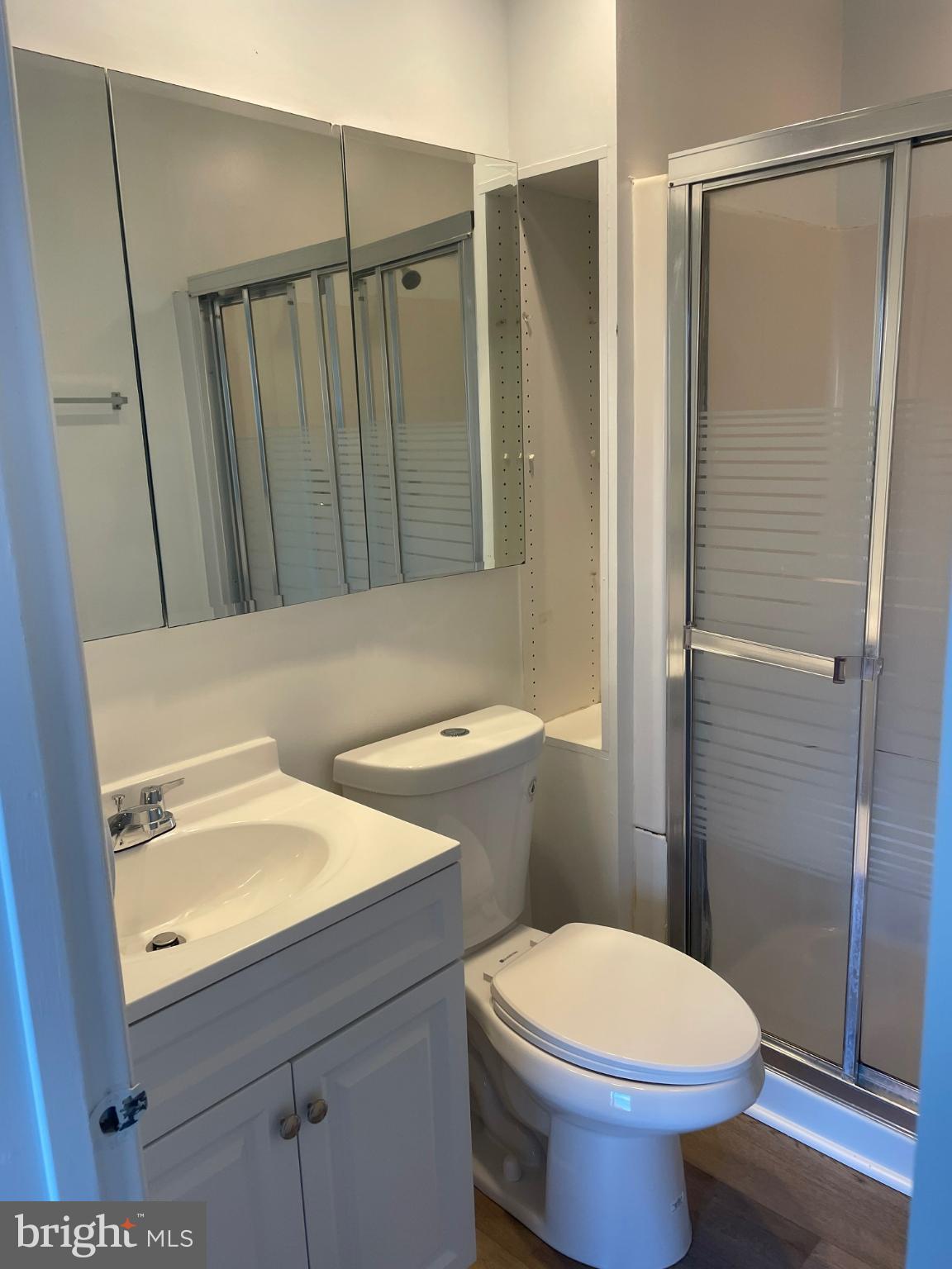 11206 White Barn Court Gaithersburg, MD 20879 - Photo 14 of 21 a bathroom with a sink a toilet and shower