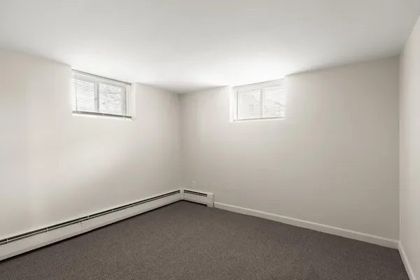 an empty room with a workbench