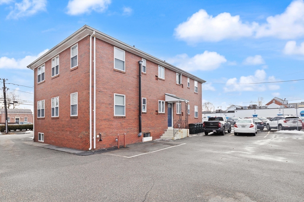 12 Central Avenue, Unit 1 Danvers, MA 01923 - Photo 24 of 25 a large building with a street